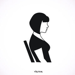 Vector silhouette of a woman who is sitting on a white background.
