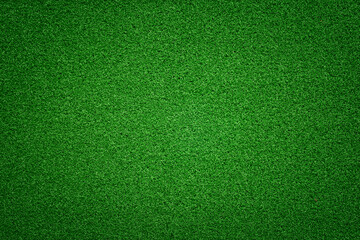 Flat green grass texture with vignette effect. Short grass cutting.
