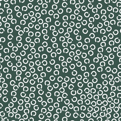 doodle abstract seamless pattern irregular chaotic white circles on contrasting background