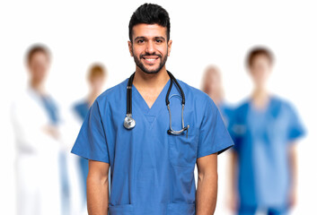 Male nurse isolated in front of his team