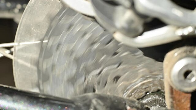 A close-up of the gears of a multi-speed bike