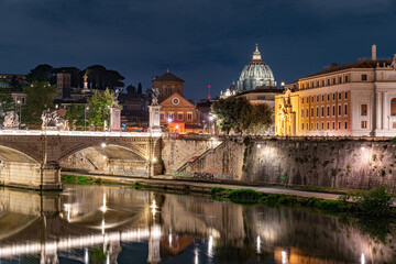 Fototapeta na wymiar vittorio emanuele II bridge rome italy with view of vatican cupola