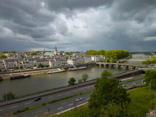Fototapeta na wymiar top view of the river, bridge, highway in the city of Angers, in France