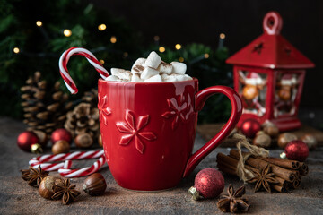Ceramic mug filled with hot chocolate and marshmallows on  dark  background