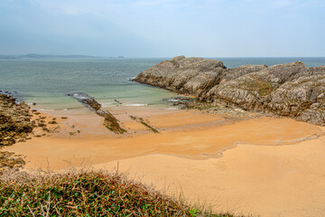 Sea cove at sunset , solitary