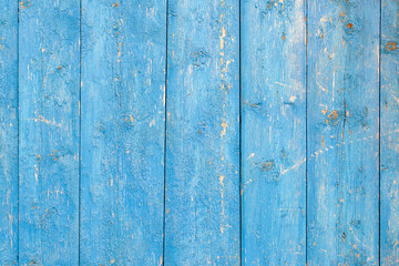 Fototapeta na wymiar Wooden background. Old blue shabby wood planks. A tattered dilapidated wall. Natural creative texture for editing and design.