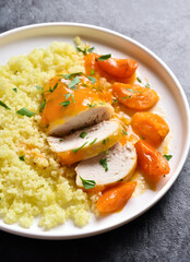 Chicken breasts in apricot sauce and couscous