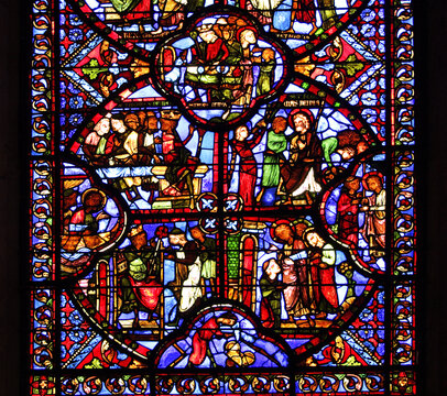 The stained glasses, describing scenes of the Saints' lifes of the cathedral Saint-Etienne on Bourges, France. Cathedral is UNESCO World Heritage Site.