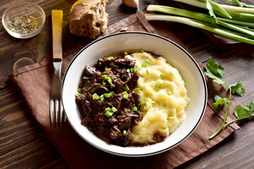 Slow cooked beef with mashed potatoes