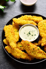 Crispy fried breaded chicken breast strips
