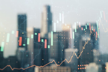 Abstract creative financial graph and world map on blurry skyscrapers background, financial and trading concept. Multiexposure