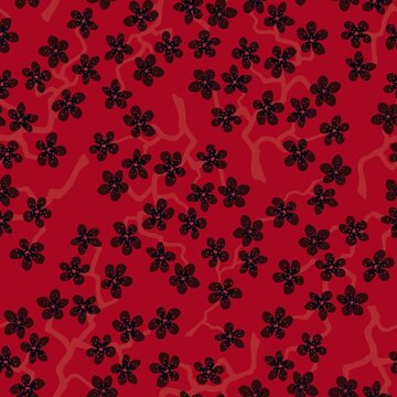 Seamless pattern with blossoming Japanese cherry sakura.Black flowers on red background