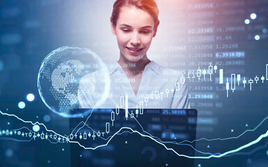 Businesswoman working with laptop, earth globe and candlesticks
