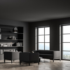 Dark living room interior with armchairs and sofa, bookshelf and window