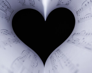 Heart music notes. The black and white concept of the love of music. Foreground soft focus.