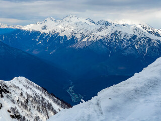 Picturesque mountain landscape with snow-capped peaks in the resort of Rosa Khutor