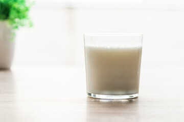 glass of natural milk on the table