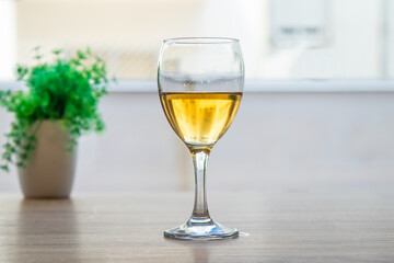 glass of white wine on the table