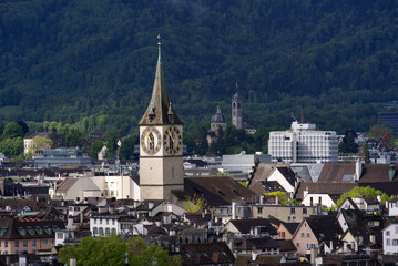Fototapeta na wymiar Old town of City of Zurich with churches at springtime. Photo taken May 23rd, 2021, Zurich, Switzerland.