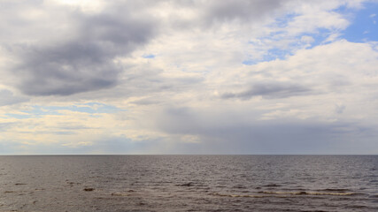 Cloudy skies above the sea