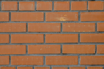 abstract background of red brick wall close up