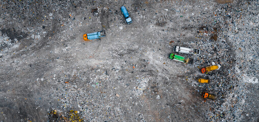Waste garbage dump household pile trash, aerial top view landfill background. Concept environmental struggle with plastic pollution banner