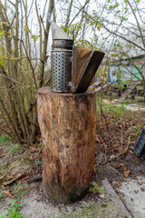 Fototapeta premium Bee smoker - smoke coming out of the equipment