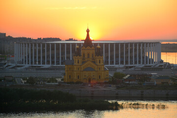 NIZHNY NOVGOROD, RUSSIA - MAY 6, 2021: Alexander Nevsky Cathedral sunset view from Fedorovsky embankment