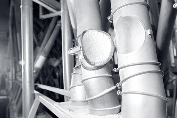 Transport pipes of white wheat flour in modern mill