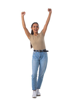 Casual girl standing with arms raised