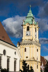 Tower of historical building of town hall at Main square in historical center of Bratislava, capital of Slovakia. Dramatic clouds in background.