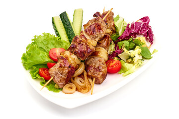 Shish kebab with fresh vegetables, isolated on white backround