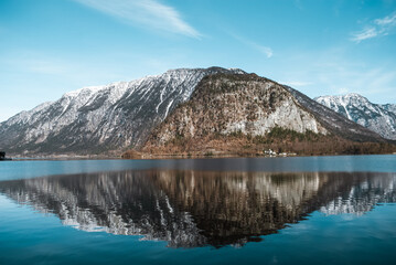 Mountain reflected in the lake in a sunny day