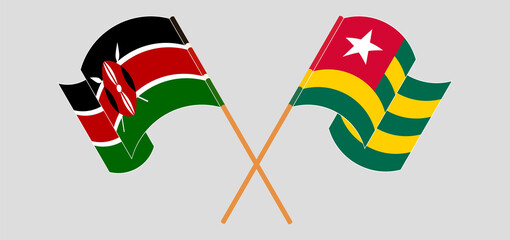 Crossed and waving flags of Kenya and Togo