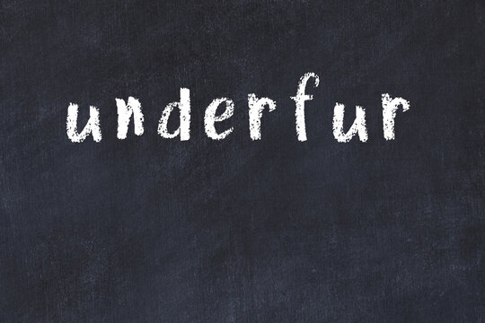 Black chalkboard with inscription underfur on in