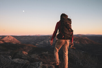 hiker on the top of mountain