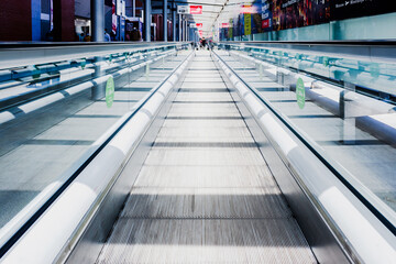 Madrid, Spain - May 20, 2021: Flat scalator mechanical walkway to speed up the pedestrian crossing...