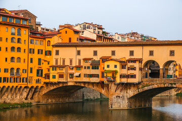 Florence, Italy. View of famous Ponte Vecchio bridge on the river Arno.