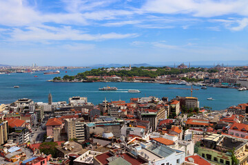 Naklejka na ściany i meble A panoramic view of the city of Istanbul from the Galata Tower to the European part of the city and the Bosporus Strait. Summer sunny day