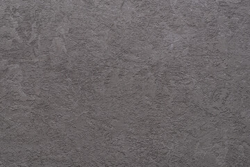 Texture of rough plastered gray wall with scratches. Surface of rough concrete scratched stucco. Abstract architecture stuccoing backdround. Сoarse сement wall as blank design element. Full frame.