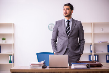 Young businessman employee working in the office