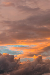 Spring sky at dusk with clouds of abstract shapes. Can be used as wallpaper or background of other projects