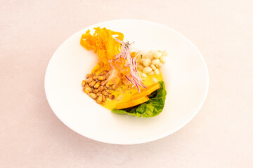 Peruvian sea bass ceviche with sweet potato, lettuce, red onion, squid
