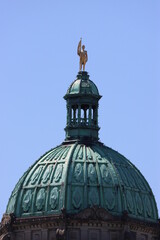 Statue of Captain George Vancouver on top of legislative buildings in capitol city of Victoria British Columbia Canada