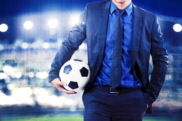 Close up of soccer manager standing in the stadium