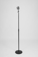 Vintage microphone for singing. Characteristic microphone of the 50s. Silver microphone.