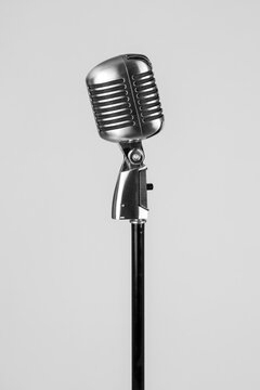 Vintage microphone for singing. Characteristic microphone of the 50s. Silver microphone.