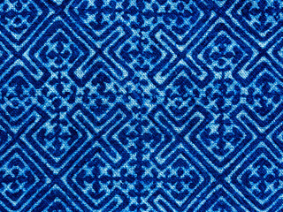 Indigo blue fabric tie dye pattern background. Indigo-Dyed fabric texture with abstract ethnic...