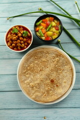Healthy vegegtarian meal- wheat chapti with vegetable cuury.