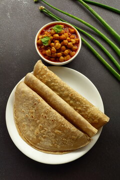 Fresh made chapthi with channa masala, -Indian foods background.